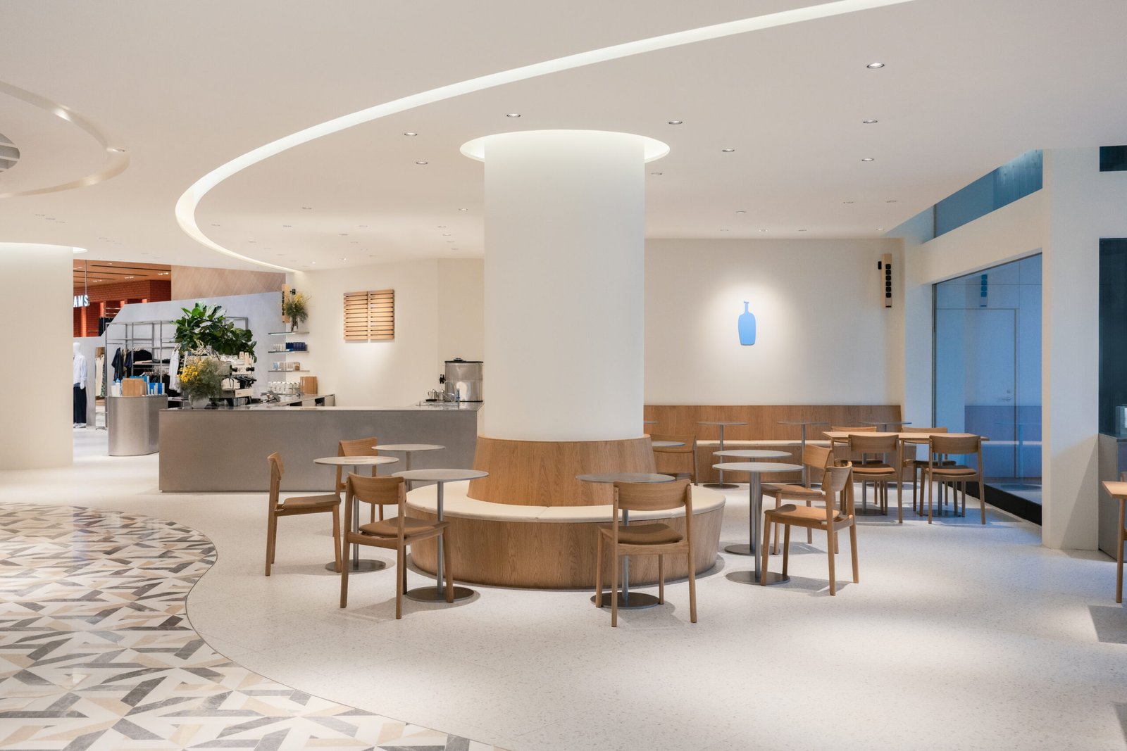 blue bottle space inside lumine. bright open coffee shop